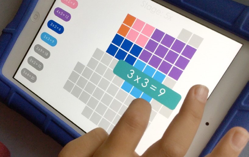 This is a photo of a maths app running on an iPad or tablet