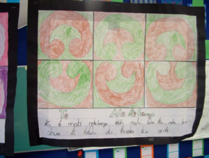 This is a studnet's drawing of what could be koru, with writing in te reo below it