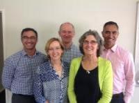 This is a photo of five research team members