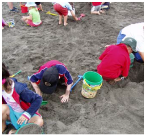 Kids playing in a sandpit