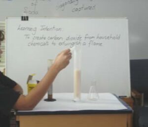 A photo of a student doing a science experiment