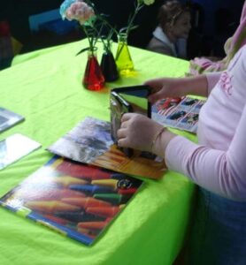 A photo of a student arranging objects on a table